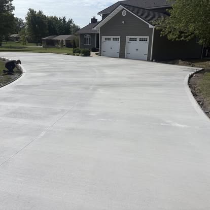 Wide residential driveway leading to garage